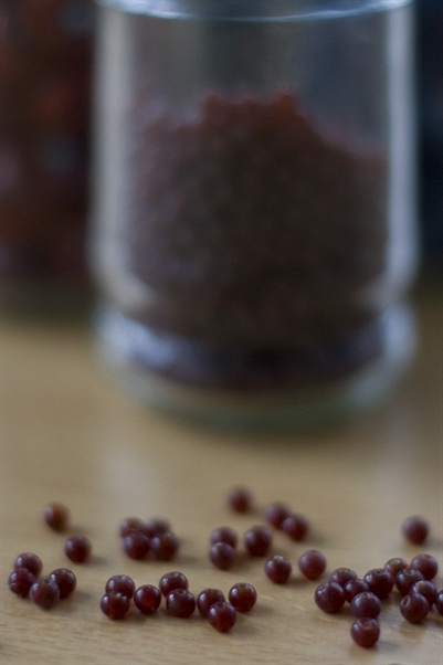 Hand-made dark red glass beads